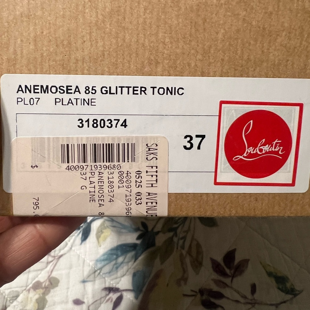 Christian Louboutin gold dresses shoe.